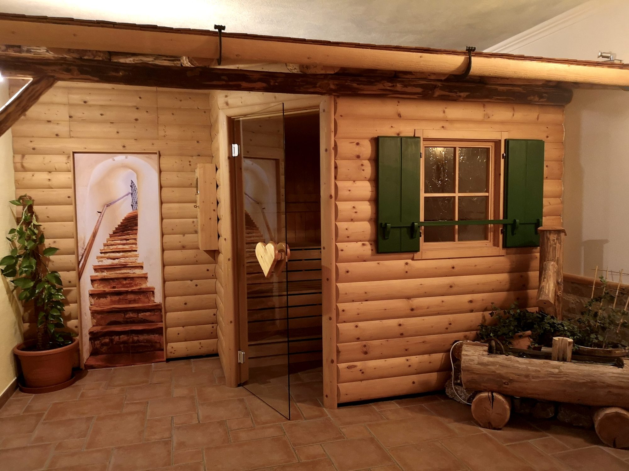 Almsauna Hütte im Wellnessbereich des Landhaus Quehenberger in Maishofen